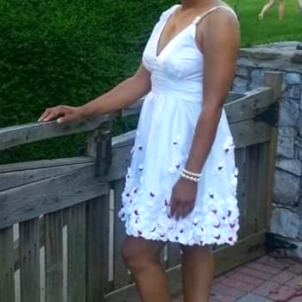 Ivory dress with ivory and pink/purple flower petals